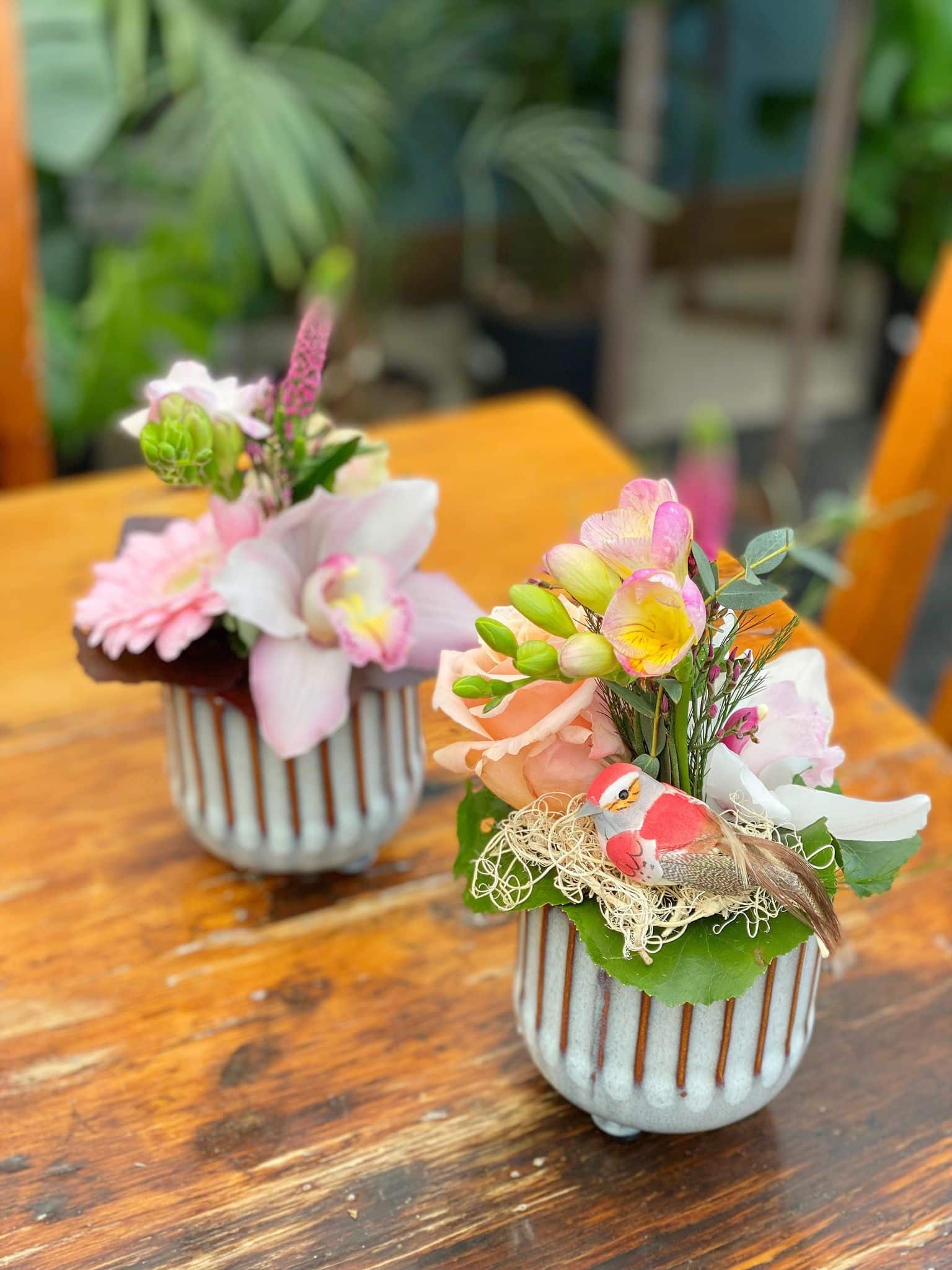 2 european arrangements are included in pinks, peaches and whites