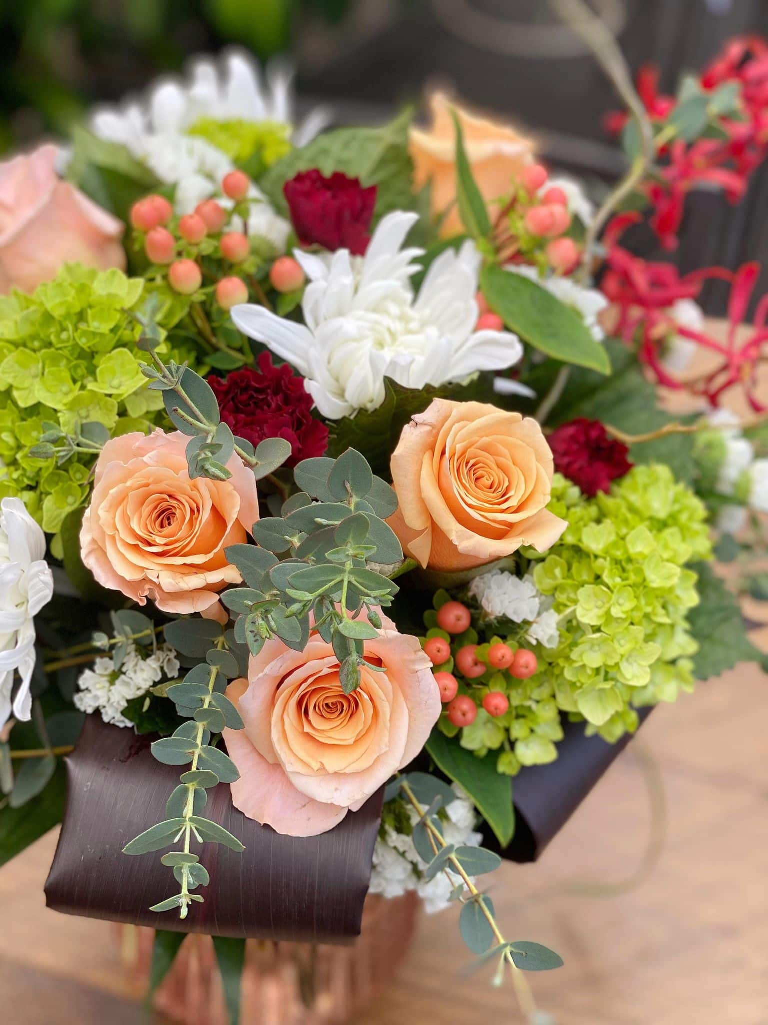 The Watering Can | Close up of the flowers in a large bouquet.