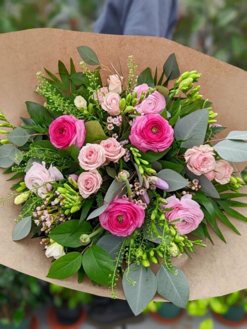 The Watering Can | A light and airy bouquet with greens and blush florals.