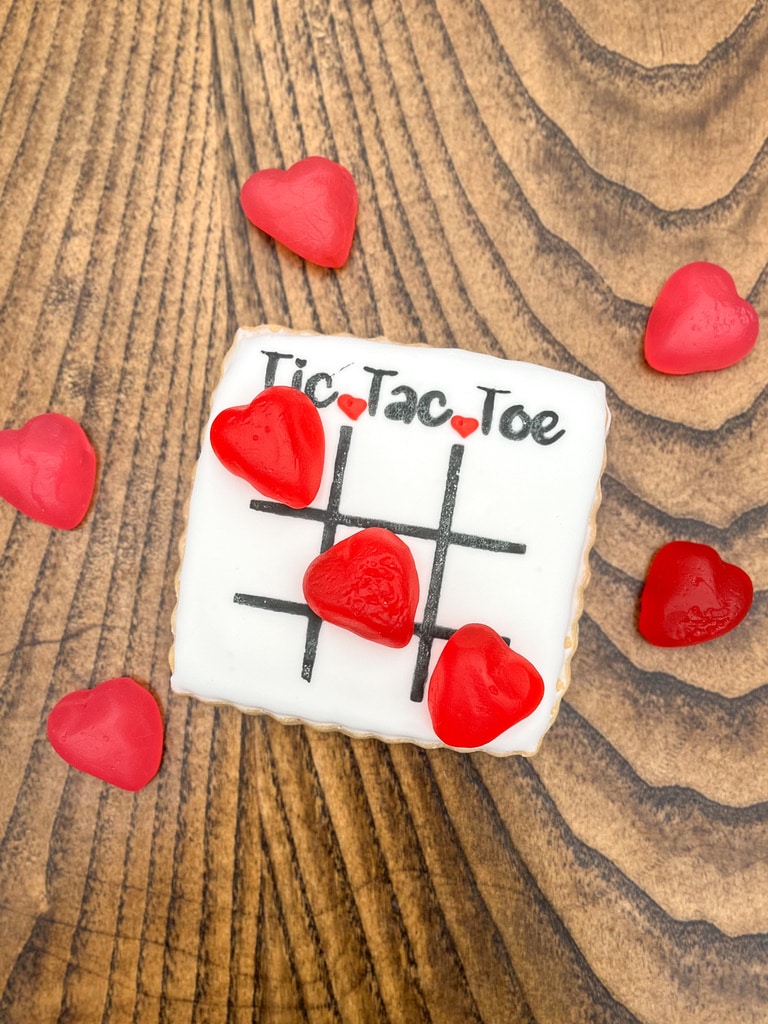 Valentine's Day tic tac toe decorated sugar cookie from The Watering Can Pastry Market