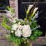 The Watering Can | An all white bouquet in a rectangular, textured glass vase.