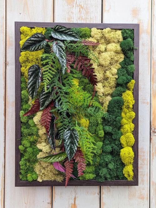 The Watering Can | An all green moss art piece with ferns and faux leaves in a dark wooden frame.